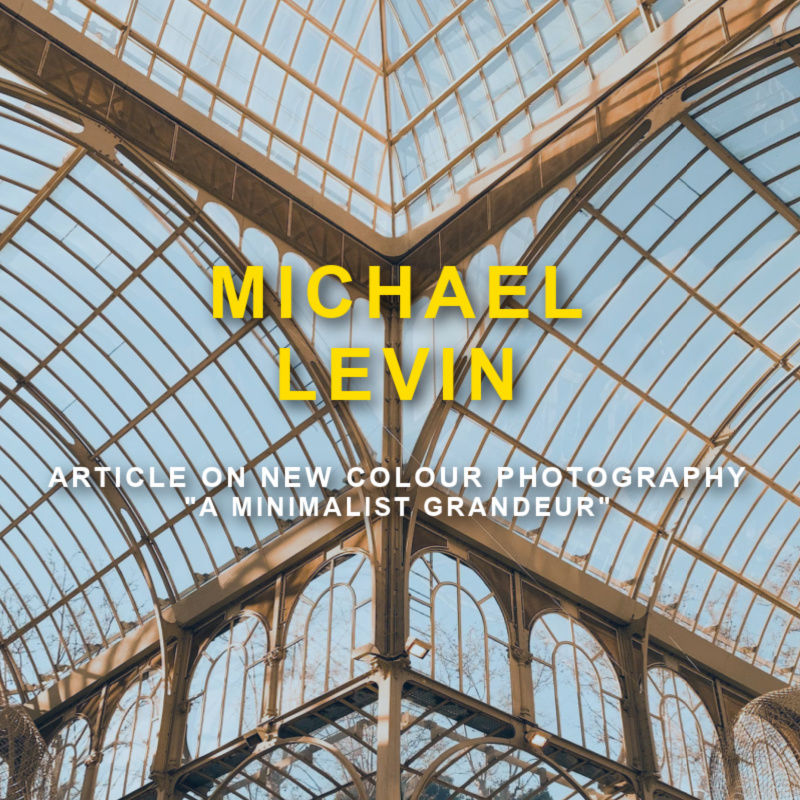 glass building with text'Michael Levin article on New Colour Photography"